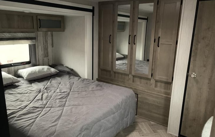 Bedroom with full closet and extra storage