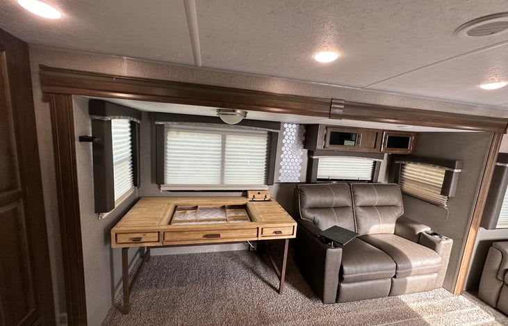 Living room area- includes heated massage love seats