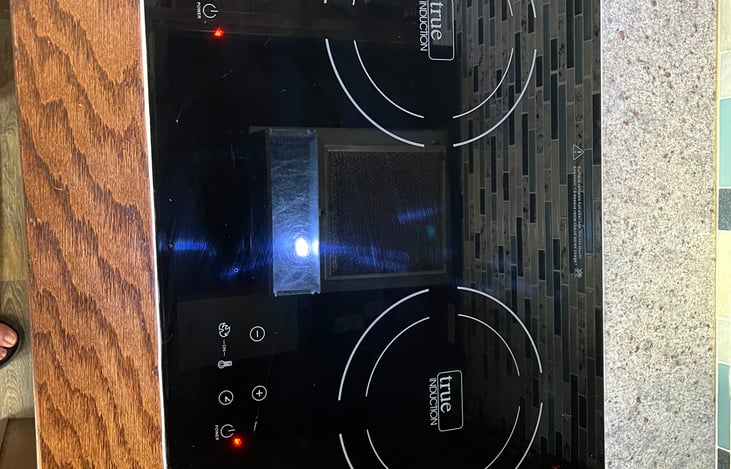 Induction Cooktop (comes with compatible pots and pans)