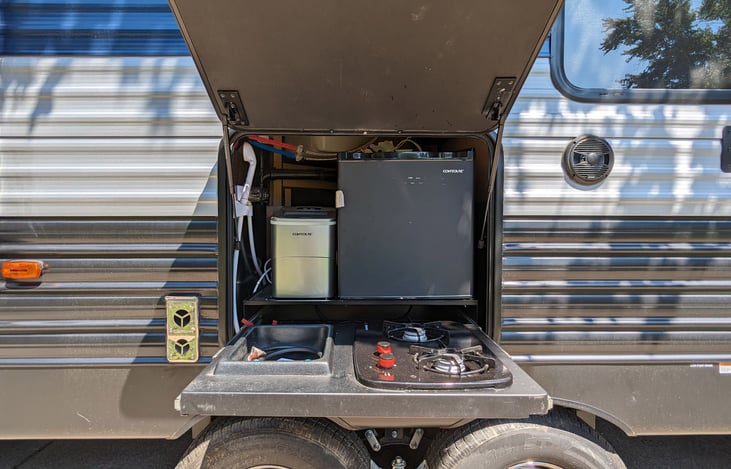 Outdoor mini fridge with propane cooktop, icemaker and outdoor shower/mini sink