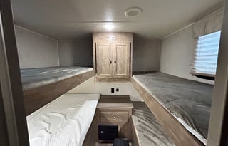 (#7) Puma Trailer w/ 4 bunks & outside kitchen