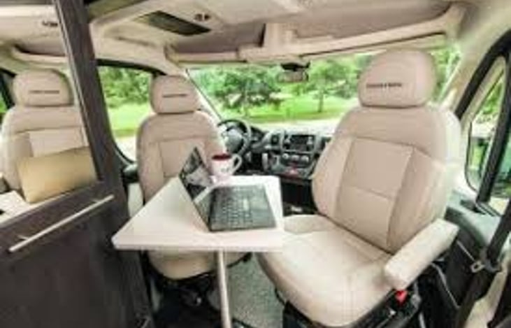 Front seating area
Here you can enjoy a meal together or maybe get some work done on the road