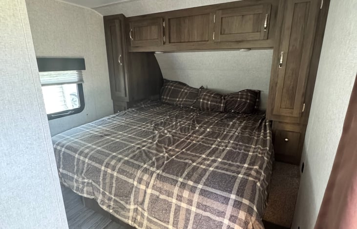 King bed with ability to walk on both sides - no climbing over each other.