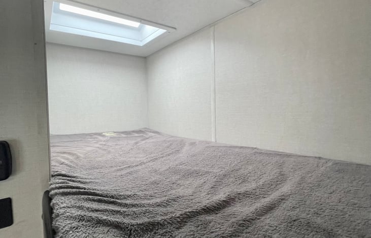 top bunk with sky light