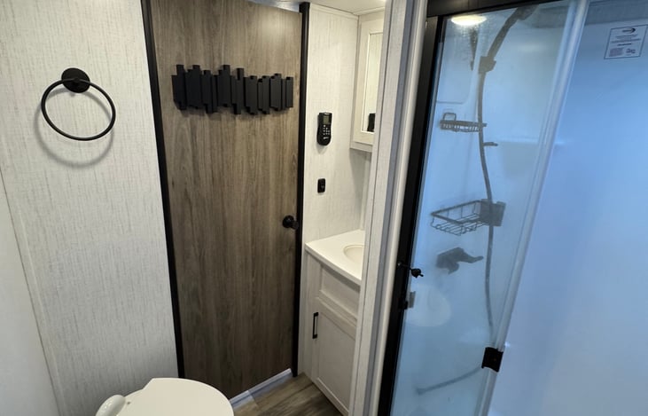 Large shower with skylight.