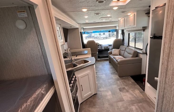 Bunk beds and kitchen area