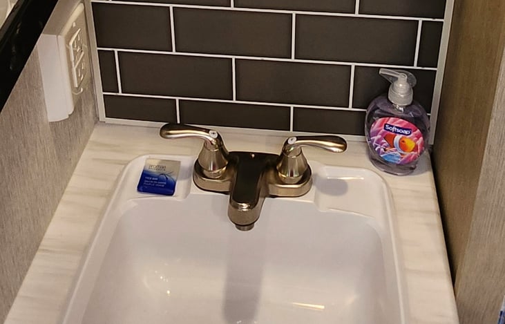 Dedicated sink inside the bathroom near the private bedroom.