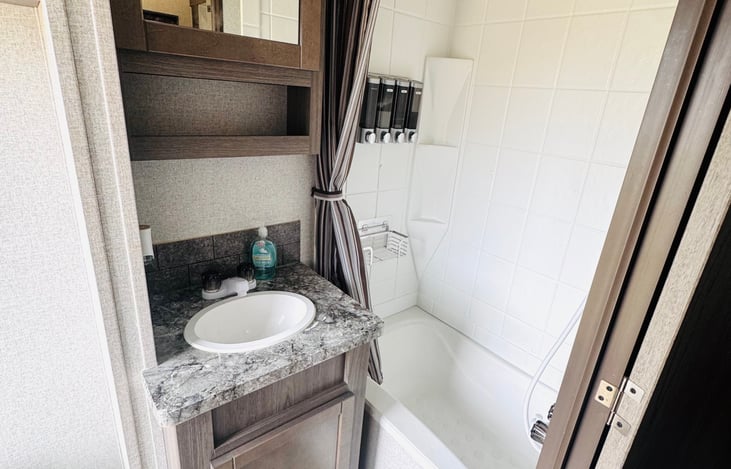 2nd Full Bath connected to 2nd Private Room with shower, sink and toilet.