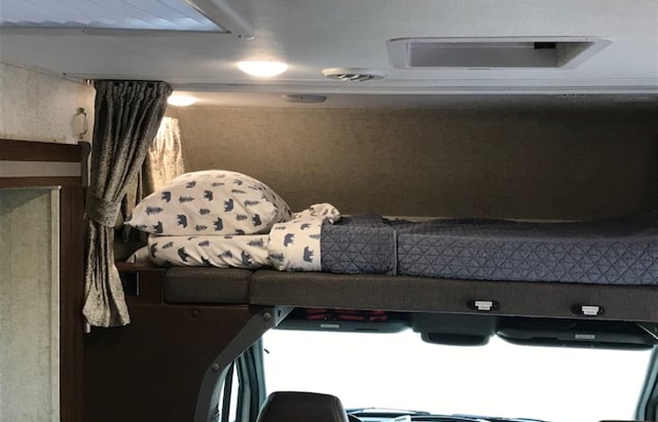 Full size overhead bed with 4" Serene Foam topper for an amazing night sleep!