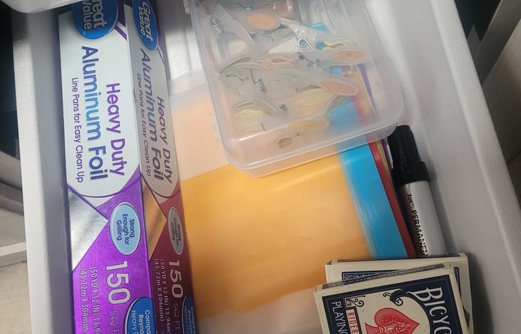Bottom drawer in kitchen- aluminum foil, reusable bags, clips