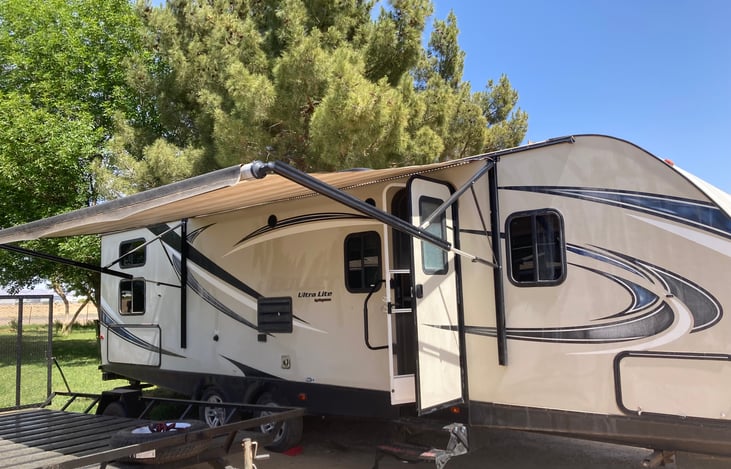 Shade, speakers, and exterior lights to relax outside.