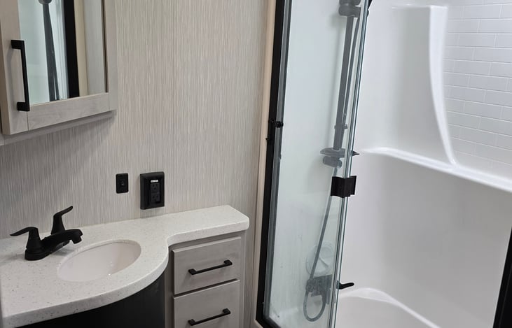 Master Bath w/ tub , shower combo.