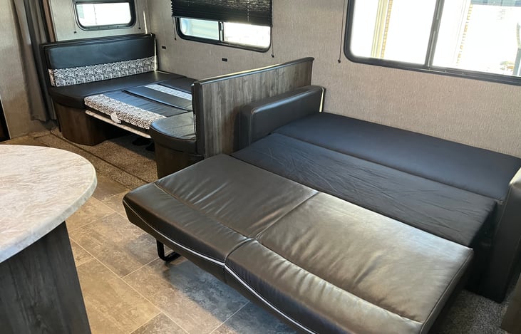 Two fold out beds in main living area. Mattress pad, sheets and blankets are provided for these beds.