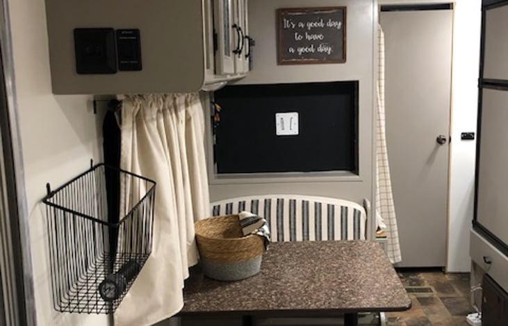 Dinning area and the table will change into a bed.