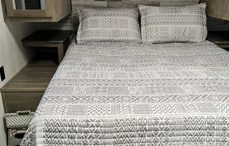 Queen size bed! Very comfortable.