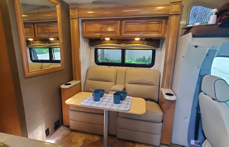 Recliners double as dining room chairs. We have a 2nd table for the front 2 seats, so you can serve 4 people for meals inside the RV.