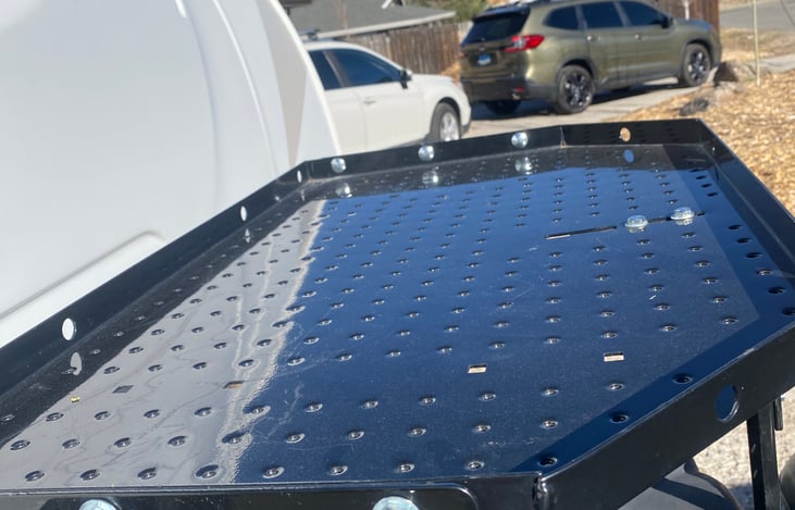 GENERATOR STAND OR YOU CAN HOLD EXTRA GEAR HERE.