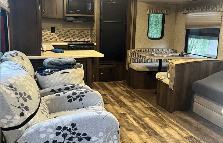 Dinette turns into bed. Storage under dinette benches.