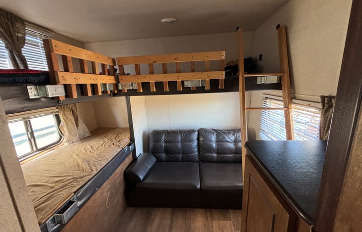 BUNK ROOM! Have kids? This is the perfect spot for them! There is a door to close. Couch can turn into a bed.