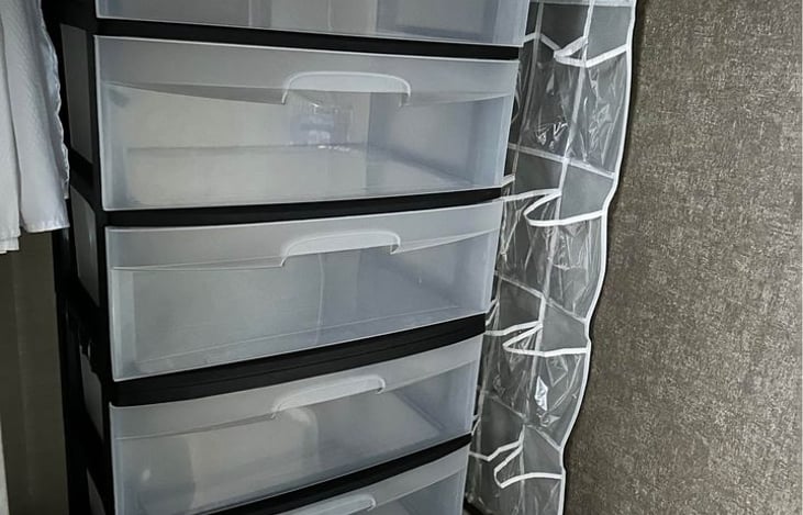 If you have no plans on using the shower... how about extra storage?
But a nice shower after a day of fun is always nice :)