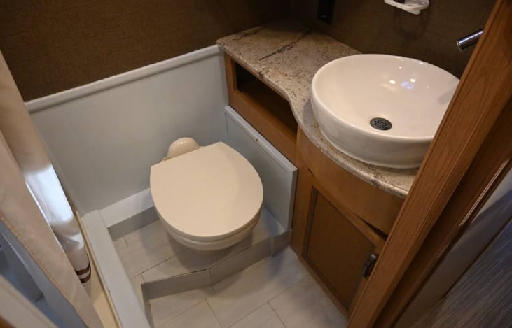 Custom vessel sink in bathroom.