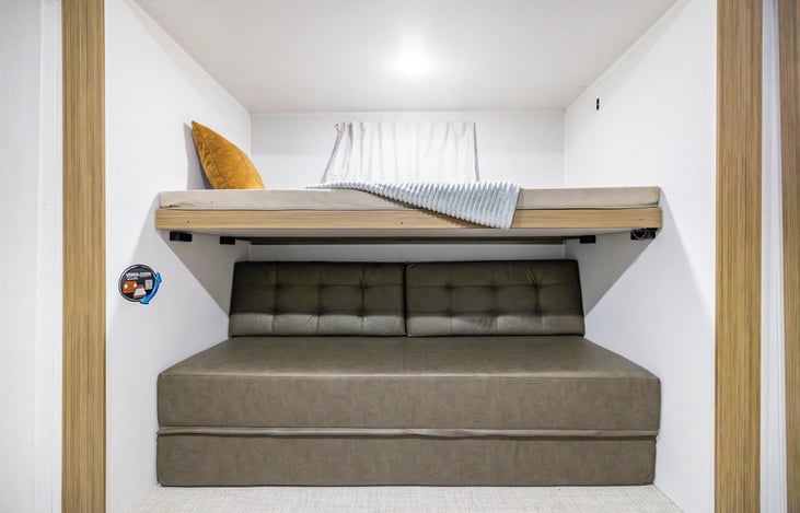 Seperate bunkhouse offers privacy and additonal bedding with several bunk beds and fold out Queen sized versa couch. USB chargers throughout.