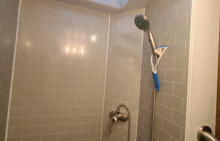 New shower with shutoff and single handle mixer.