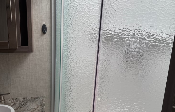 Shower is ready to use with water hookup.