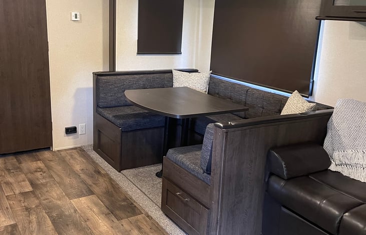 Dinette. Seats 6 comfortable but can fit 8.