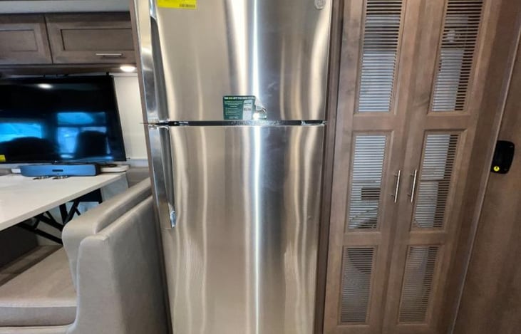 residential fridge with freezer and ice maker, washer and dryer