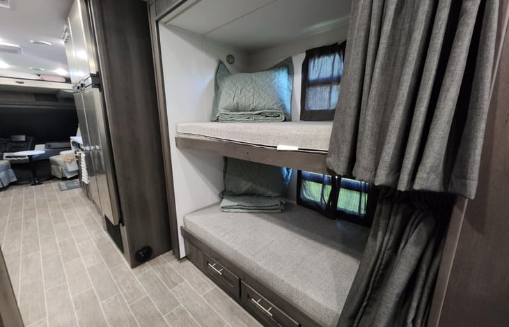 Double twin bunks. Both have lights and USB plugs for charging.