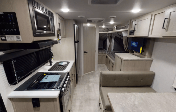 Interior Facing the Rear, Including Two Fold Out Queen Beds