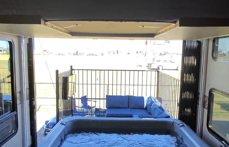 This is the view from the interior of the Hot Tub Suite to the fenced in deck