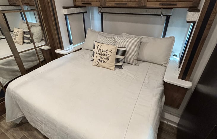 Private master bedroom with a king bed.