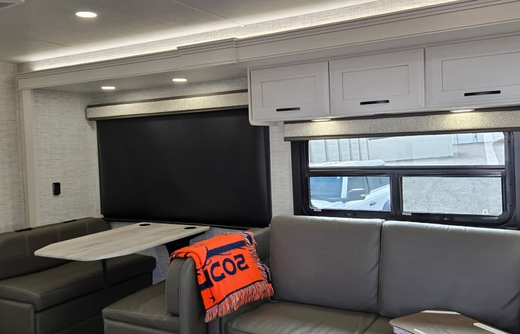 Dinette and couch convert for sleeping.