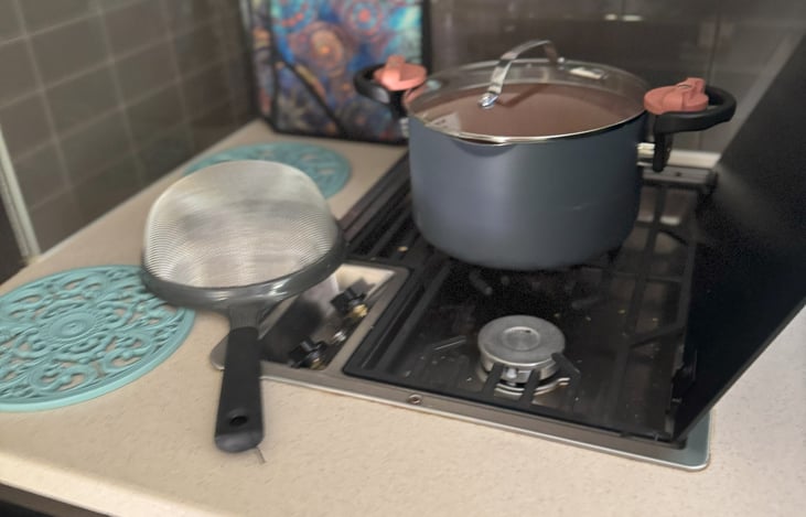 Everyone needs a pasta pot and strainer while away