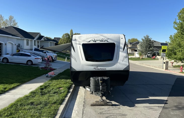 Dual propane tanks in front provides ample fuel for the heater, water heater, stove/oven, and fridge.