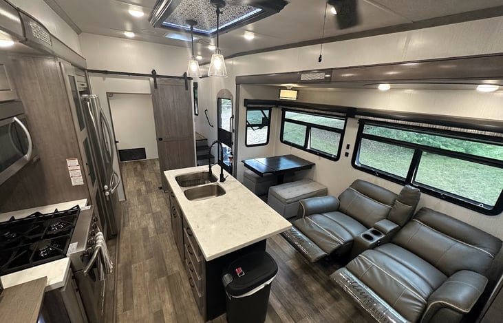 Kitchen and Living Room Space viewed from the rear corner of the cab.