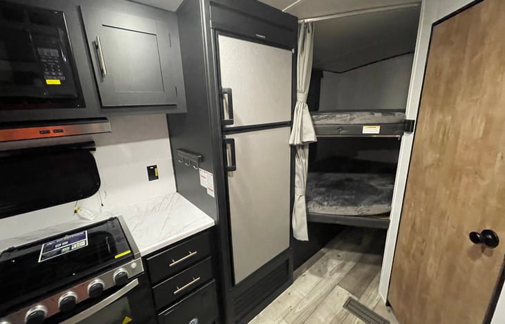 Fridge / freezer, 2 bunks.