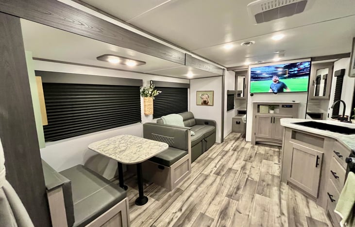 Enjoy the space while playing cards at the dining table or reclining on the couch~ both dining set and futon fold out in to sleepers