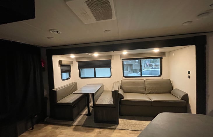 Couch and table convert into beds.