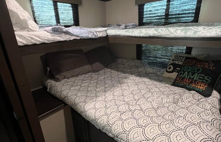 Bunks - 2 twin size bunks (on top) and 1 full size bed on the bottom