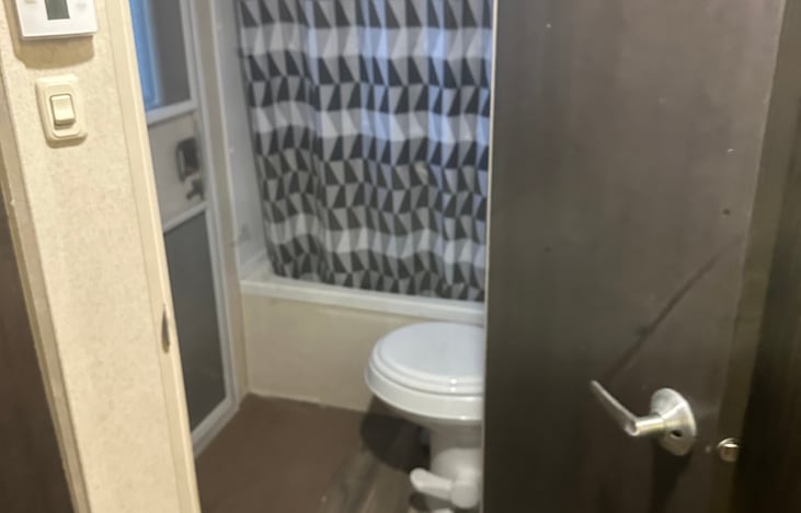 Bathroom w/ full shower, toilet & sink