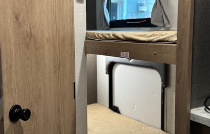 Two bunks for sleeping or storage