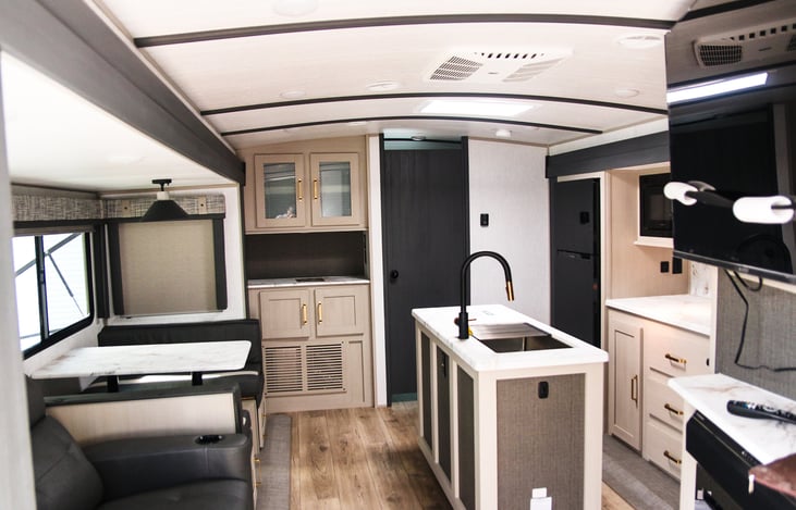 Spacious kitchen to include walk in pantry, 3 burner stove, oven, microwave and a plenty of storage.