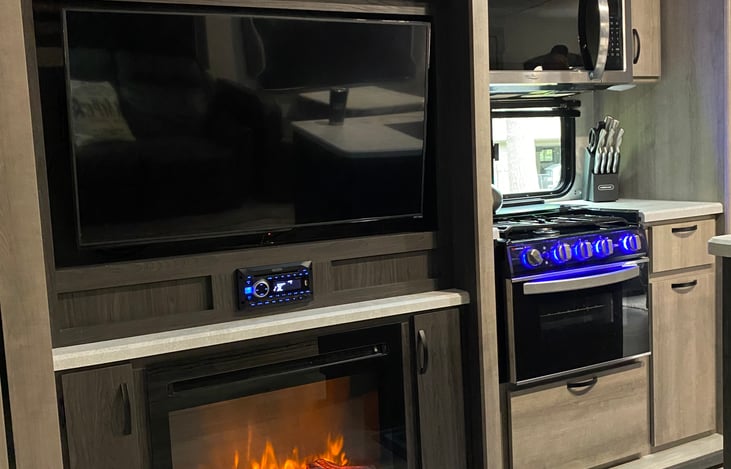 Cozy up to the fireplace and login to your favorite apps on our Roku tv!