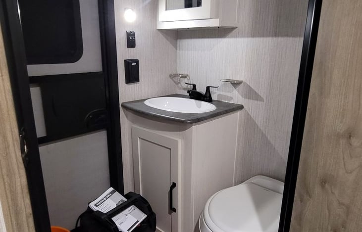 Half bath near the bunkhouse.  Great for coming in using the facilities and getting back outdoors