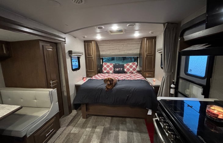 The couch folds in and the Murphy queen size bed drops down.