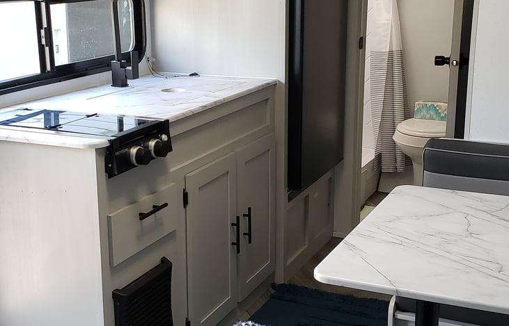 Table folds down to be made into the 4th bed.