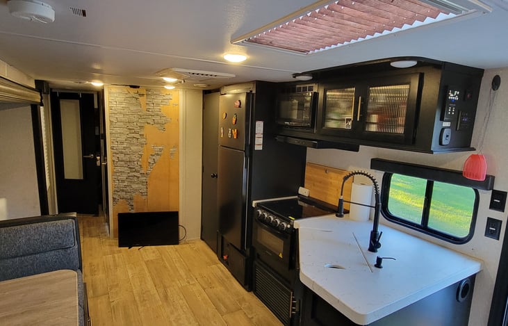 TV wall is being updated in this picture!